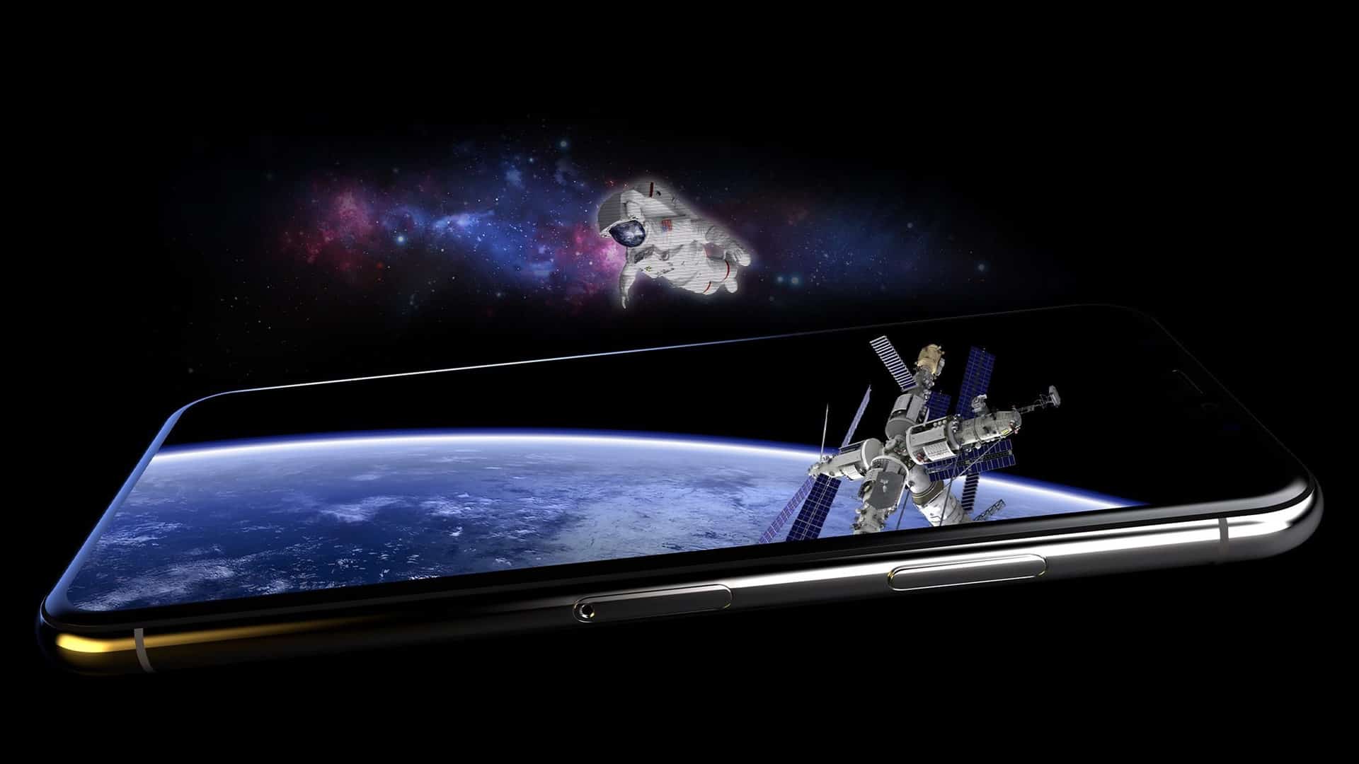 Smartphone floating with simulated astronaut hologram in space