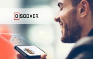 Discover Magazine logo with man looking at simulated RYZ holograph
