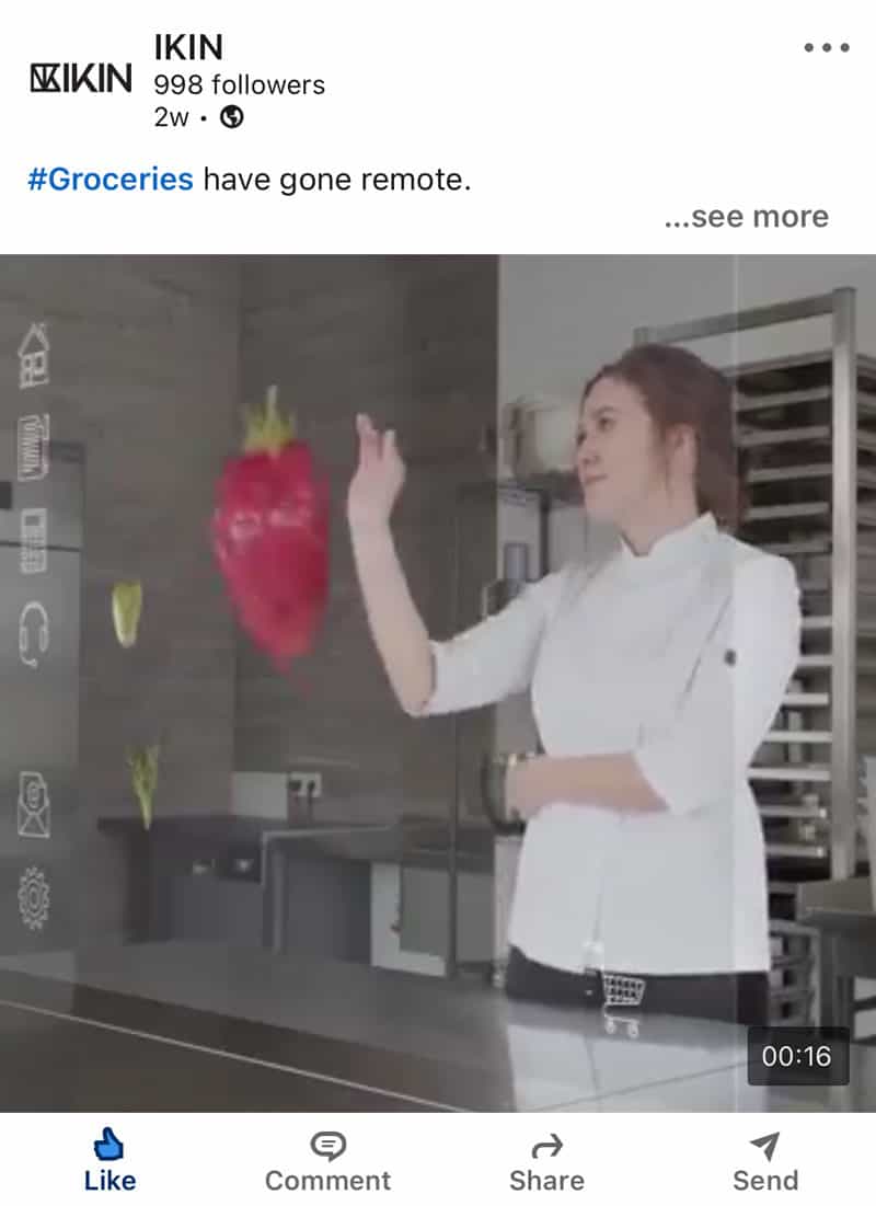 Woman grocery shopping with holographic strawberry